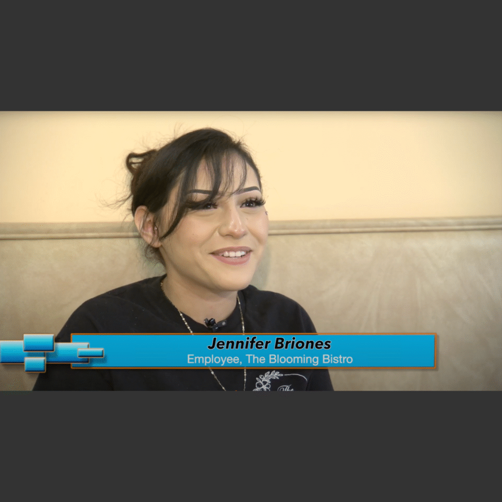 A female employee of The Blooming Bistro